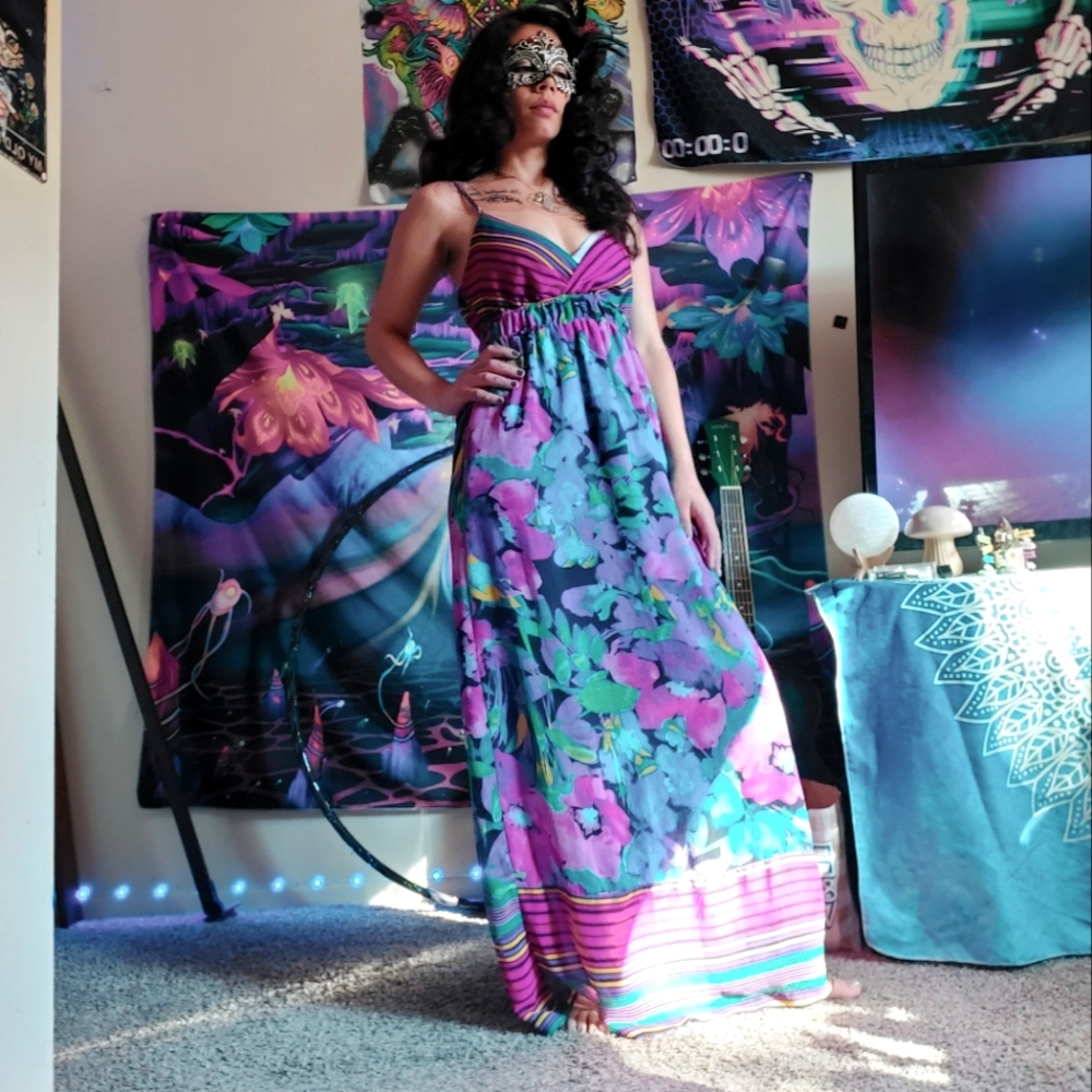 Floor length floral dress. Purple blue teal pink.